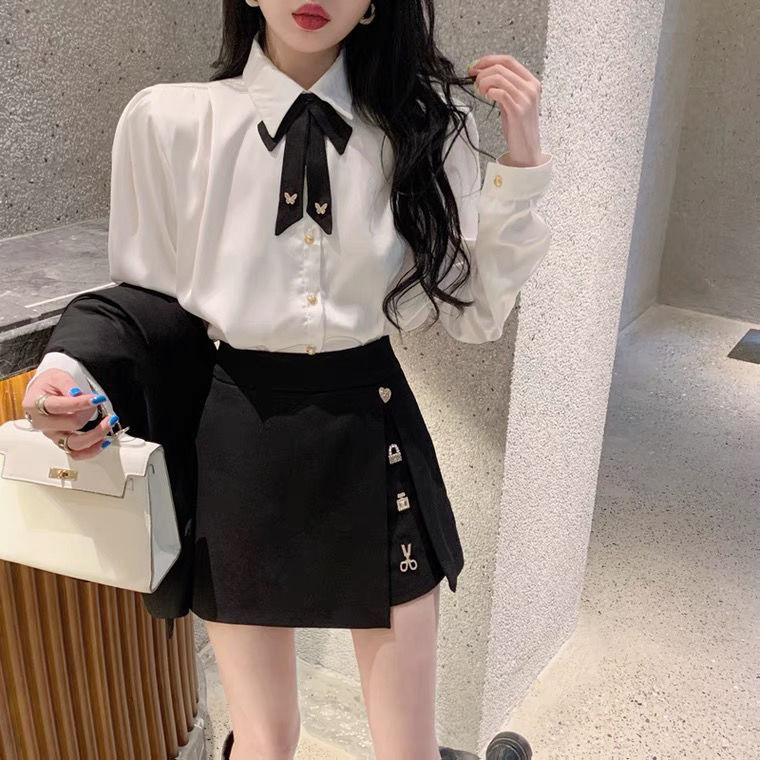 GraceChic Frühlingsoutfit: Zweiteiliges Set aus Bluse mit Schleife, Puffärmeln und hochtailliertem, schwarzem Rock mit Schlitz_voghion.com