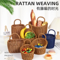 藤の台所のショウガのニンニクをまねてかごの復古の壁を収納してかごを掛けます。