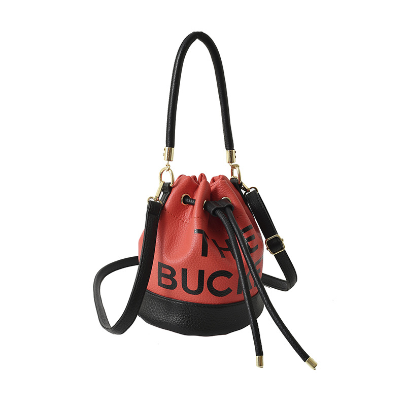Bolso de hombro femenino casual todo-fósforo diseño de nicho sentido contraste color costuras cubo bolso de mano moda tendencia bandolera