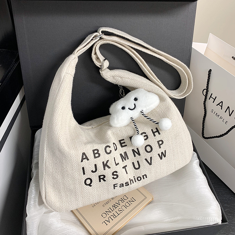 Bolso Tote de gran capacidad de moda literaria para mujer 2024 verano nuevo bolso de hombro casual simple bolso de mensajero de sentido avanzado