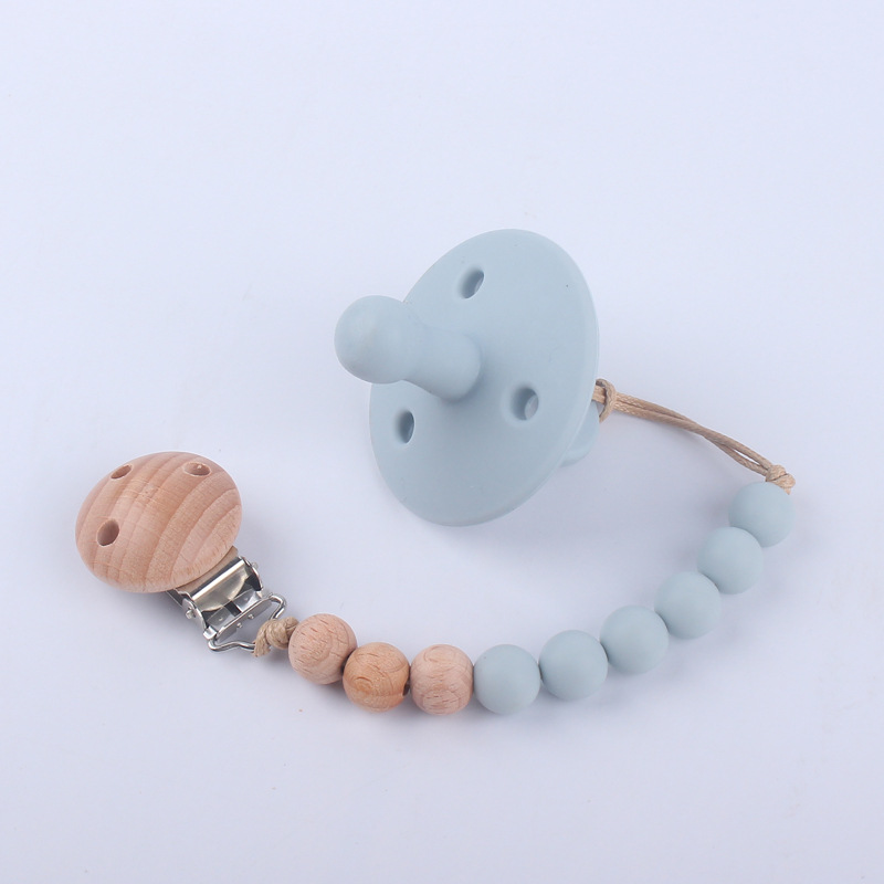 Nuevos suministros para bebés chupete bebé pezón de silicona creativo bebé mordida Cadena de pezón de silicona conjunto de dos piezas
