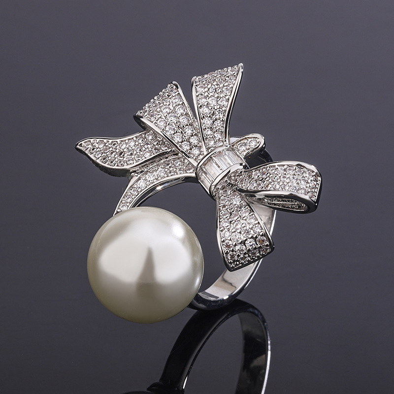 2023 nuevo estilo Zhuang Shengsheng joyería nuevo fondo de cobre chapado en oro con incrustaciones de perlas retro arco anillo mujer 12mm