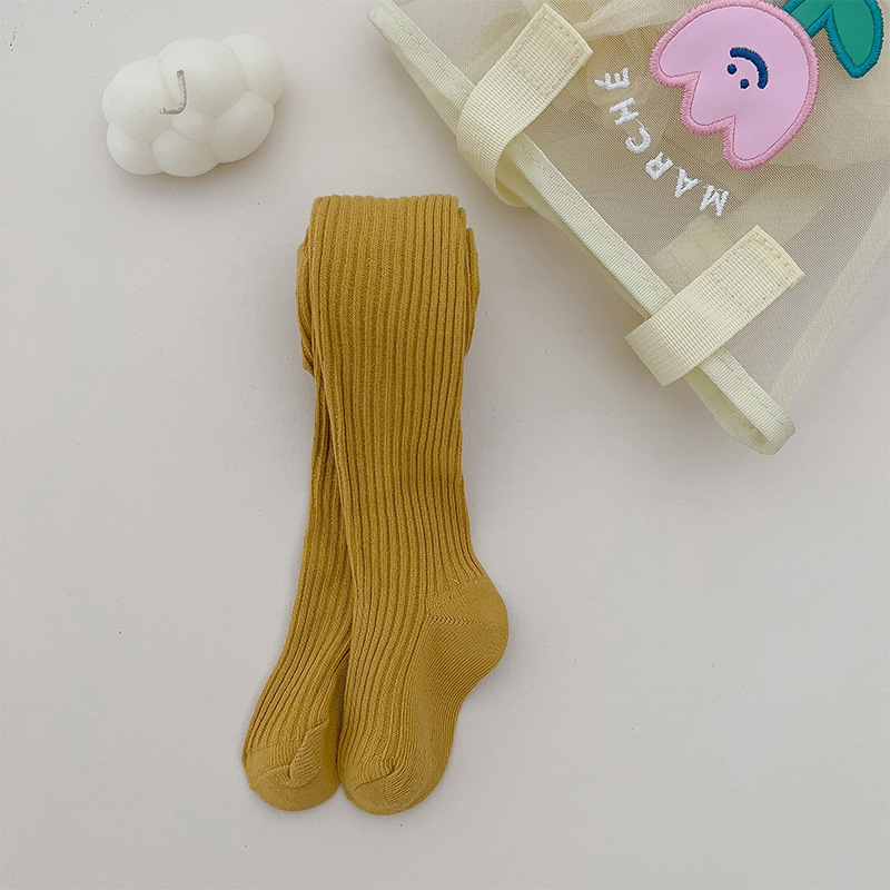 Nuevo color sólido rayas verticales polainas de las muchachas del otoño y el invierno estilo coreano ocasional los niños ropa exterior pantimedias blancas en stock