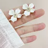 White mosquito coil pearl, ear clips, flowered