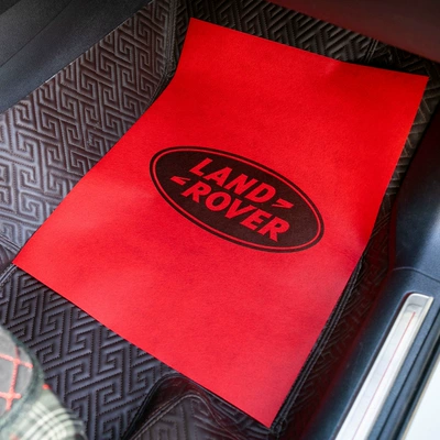 Cowhide Foot Mat Paper for Car – Universal Foot Pad - 50-sheets-of-enlarged-4253-red-land-rover-logo