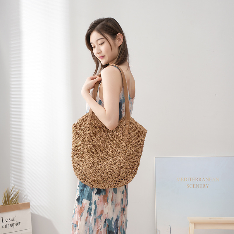 Nueva celebridad de Internet de gran capacidad bolso de viaje de vacaciones playa tejida bolsa de hombro de Europa y América retro bolsa de paja de color sólido