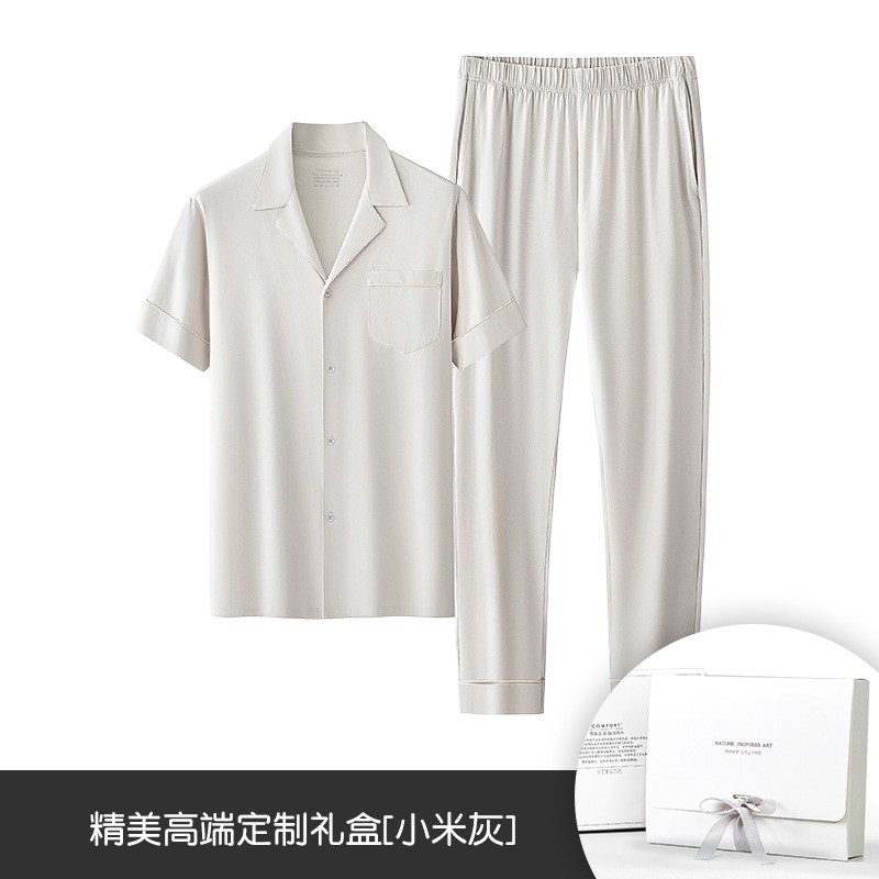 Primavera y verano nuevo estilo 60 algodón modal ropa de hogar para hombres estilo delgado puede salir el conjunto de pijamas del año natal en stock