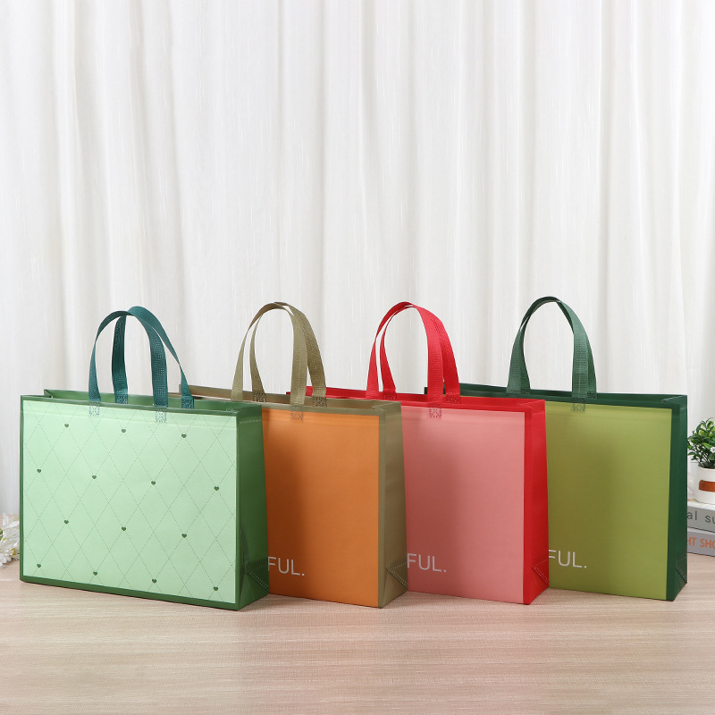 Bolsa de mano no tejida colorida ropa zapatos necesidades diarias bolsa de compras de gran capacidad almacenamiento bolsa de tela no tejida portátil