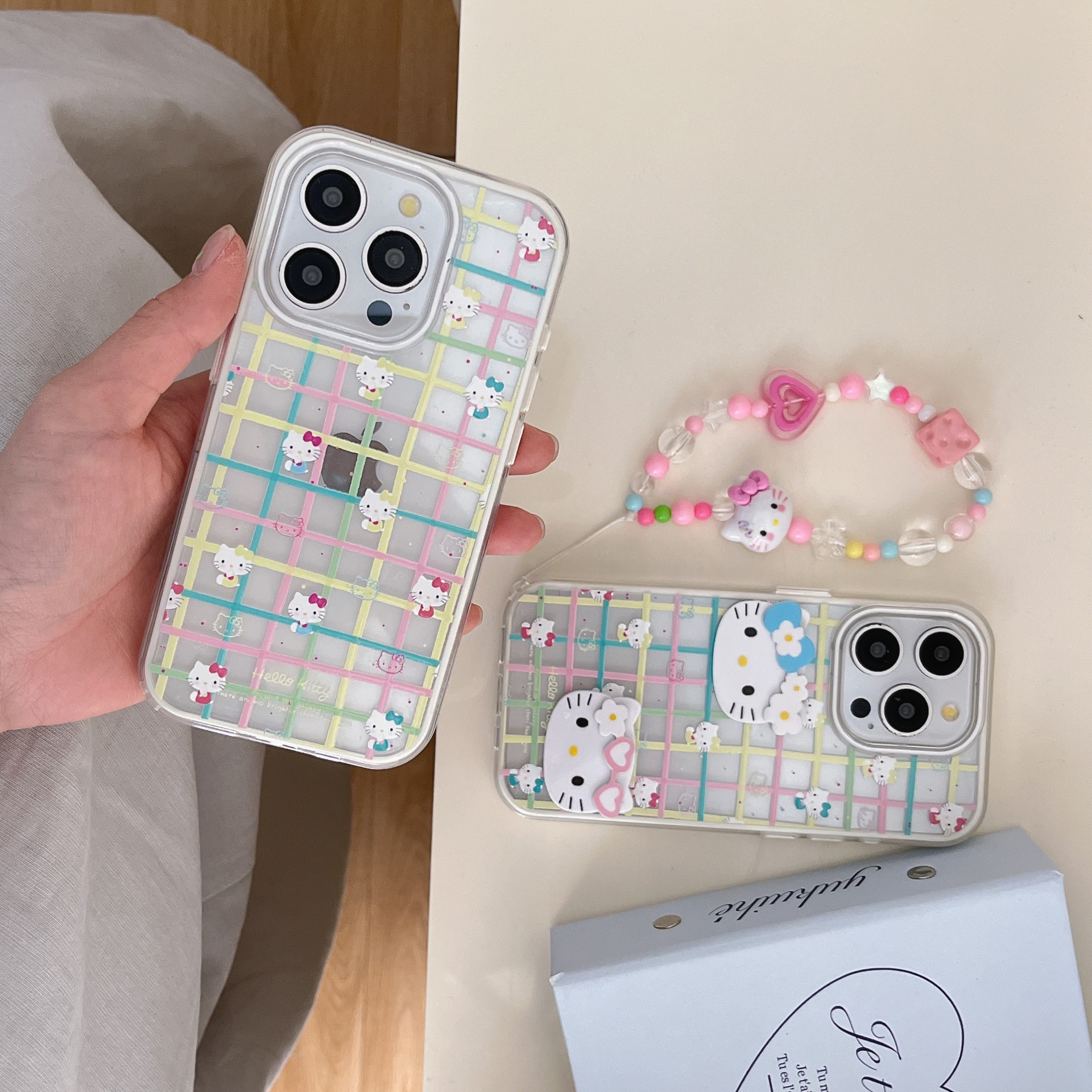 Divertido gato KT a rayas de color de dibujos animados para Apple 16ProMax personalidad 15Pro funda para teléfono móvil 14/13 nuevo 16