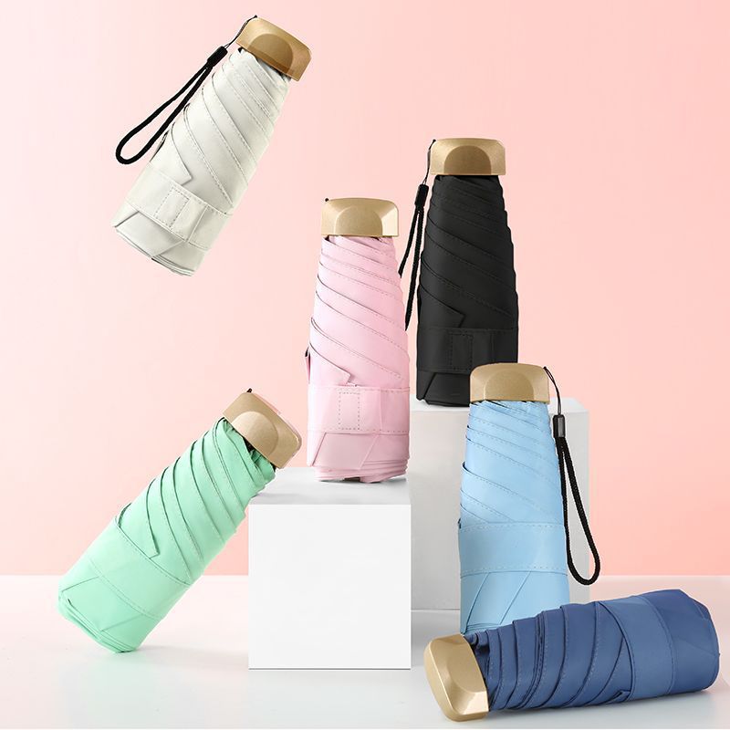 Paraguas de bolsillo plegable mini de cinco pliegues, paraguas publicitario manual tipo cápsula con impresión, paraguas portátil para dropshipping