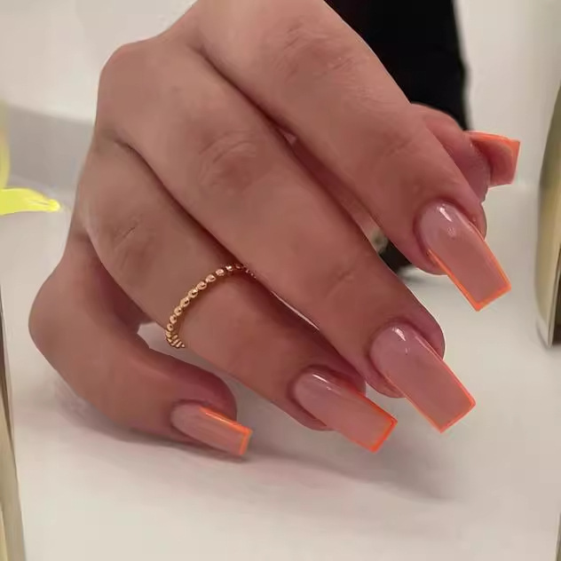Europe and the United States long vitality orange trapezoidal French side simple hot girl fake nails orange French fine side finished mixed batch