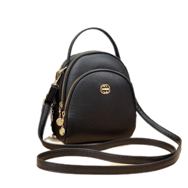 Guangzhou Hengli 2024 nueva moda mochila pequeña bolso de mano bolso de teléfono móvil madre de mediana edad bolso de mensajero de tres usar