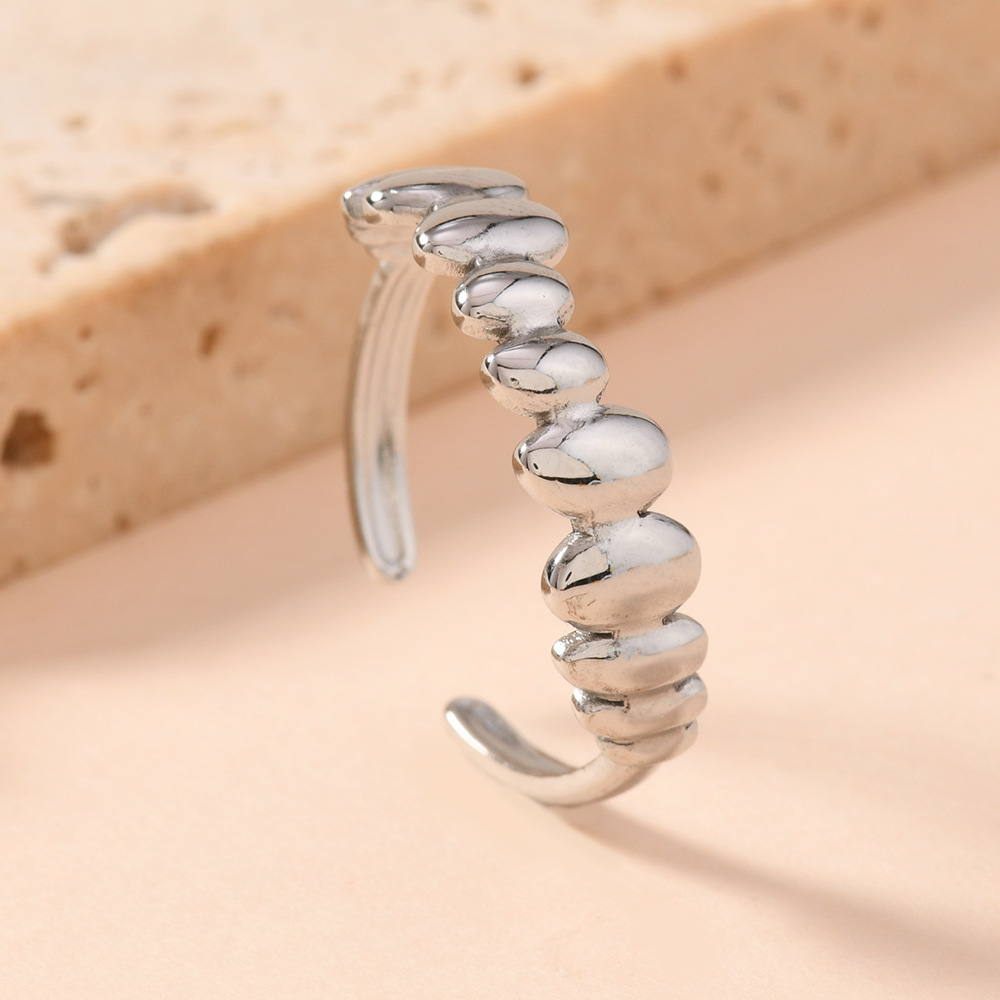 Diseño de moda transfronterizo sentido de joyería de estilo punk personalidad acero inoxidable presión de aceite colmillos dientes titanio anillo abierto de acero