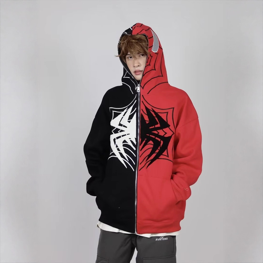Trendy contrasterend Spider-Man-cartoonvest met rits voor heren en dames, losvallend model._voghion.com