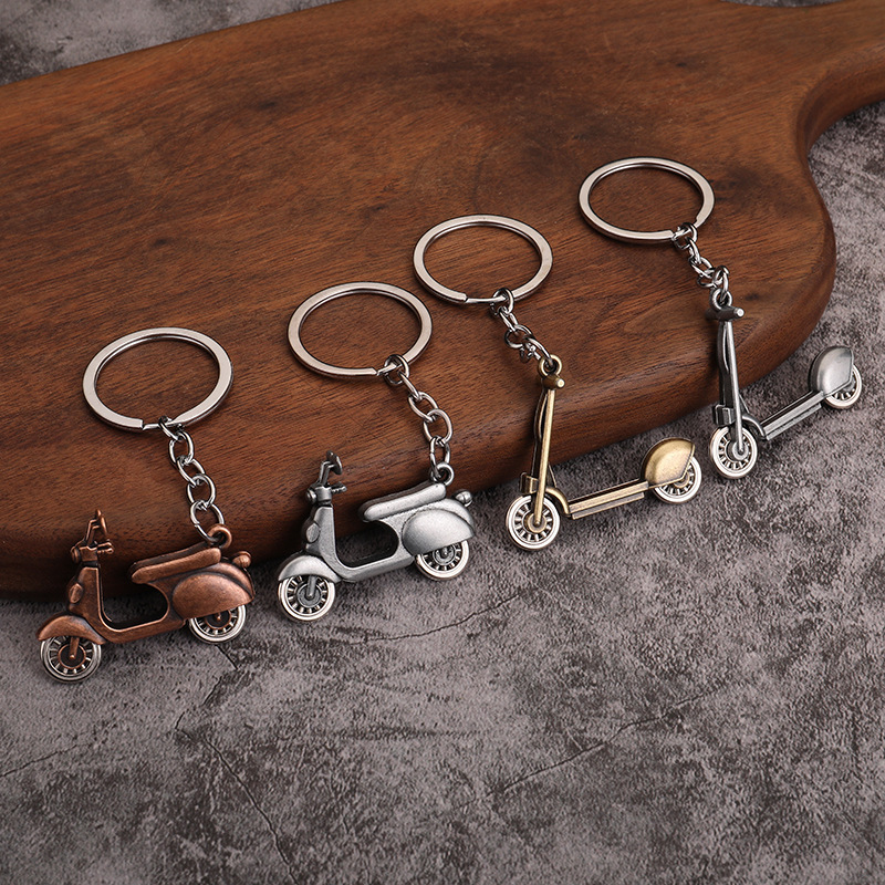 New keychain wholesale car logo keychain personality motorcycle electric car scooter keychain