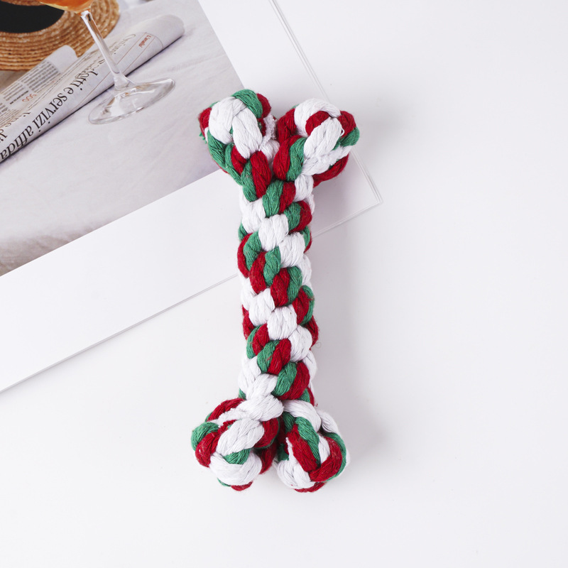 Juguete de cuerda de algodón para perros de Amazon, popular, trenzado en forma de hueso, resistente a las mordidas y a las mordidas de perros.