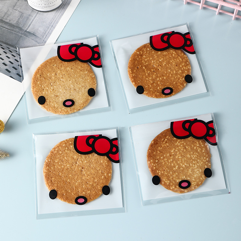 The new classic cat self -stick bag candy bag hi sugar packaging bag gift bag west pocket biscuit bag 7*7+3 3
