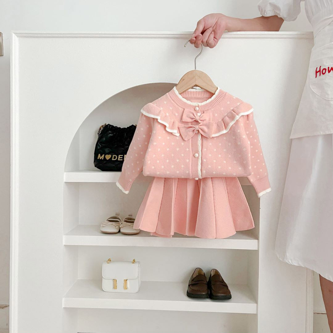 Flickor prickiga barnkläder med rosett och westernstil 2023 höst/vinter nytt koreanskt stickat set med två delar_voghion.com