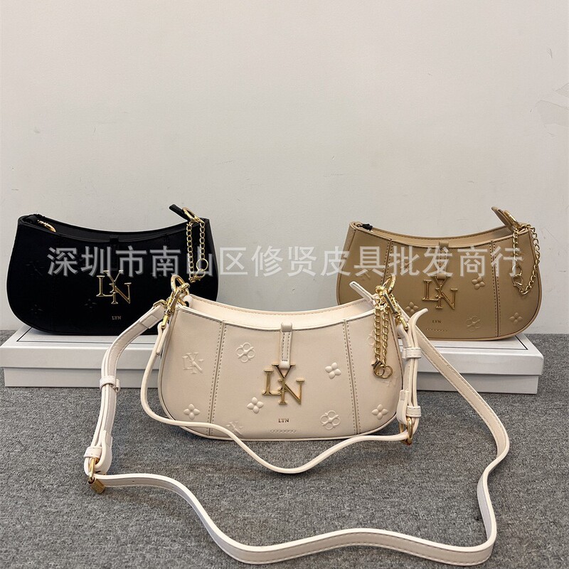 LYN ACCS embossed stitched baguette bag hand-held single shoulder messenger bag