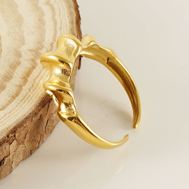 Anillo de torsión ajustable de acero de titanio francés transfronterizo hembra anillo de torsión de hilo irregular de personalidad simple europea y americana