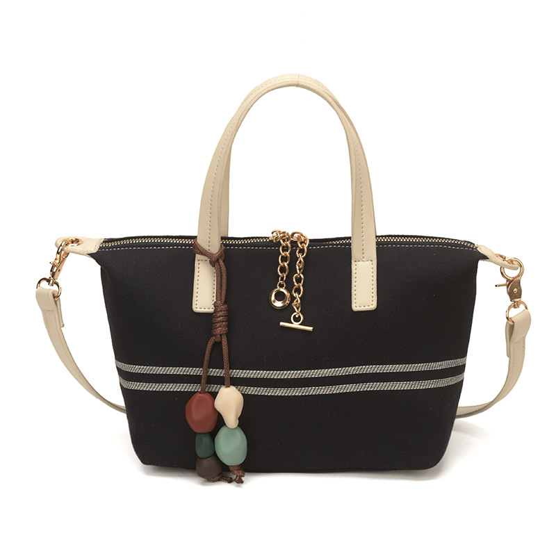 Tela estriada bolso de bolsillo de mano mujer 2026 venta caliente nuevo estilo de alta calidad sensación de moda versátil bolso de hombro