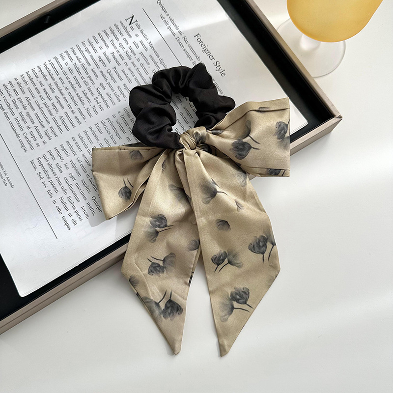 Anillo de cabello de arco femenino retro elegante correa francesa temperamento de alta sensación de impresión de anillo de intestino suave tocado versátil