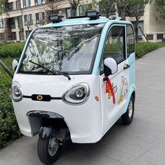 電動完全密閉三輪車、国家標準モビリティスクーター、女性用電動バッテリーカー、子供を送迎するための小型家庭用新型モデル