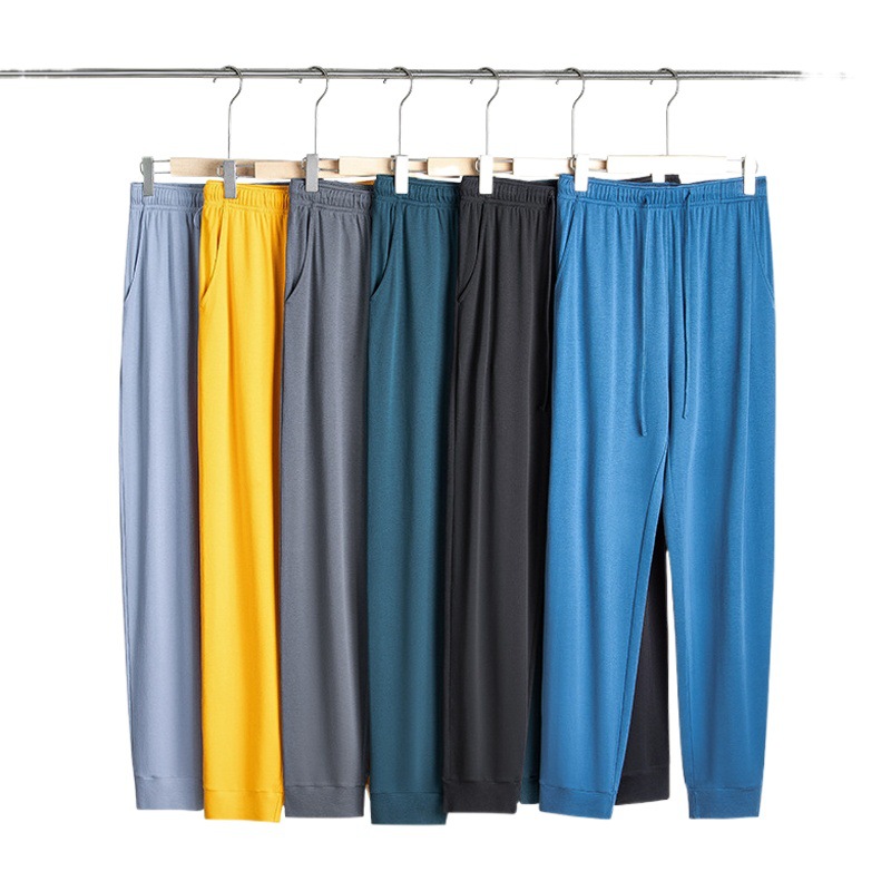 50 agua de algodón de seda suave otoño y invierno para hombres pantalones caseros casuales sueltos delgados de color sólido pantalones de pijama en stock