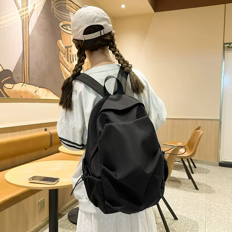 新款双肩包轻便女生ins风背包男款时尚大容量初中高中大学生书包