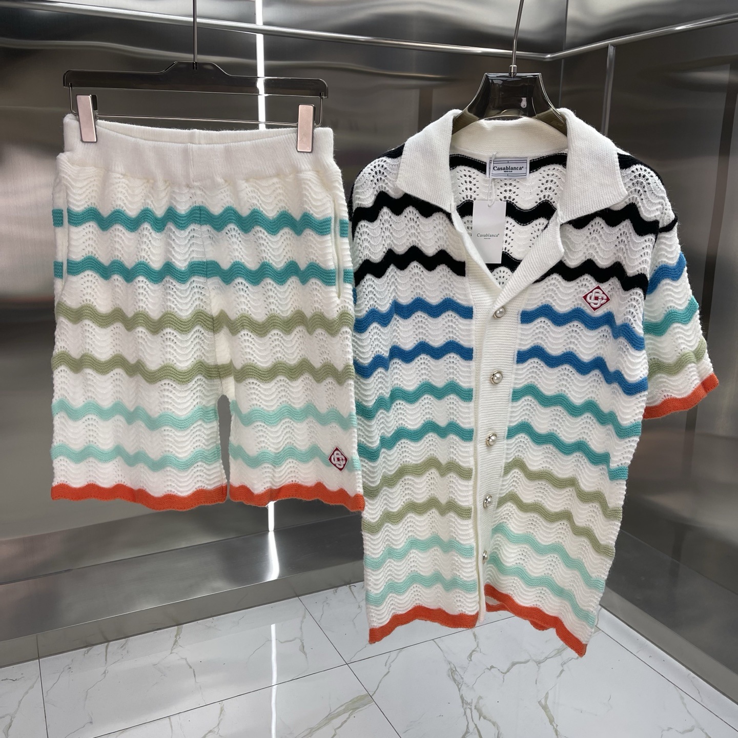 Comercio exterior casa Casablanca suéter suéter de manga corta jacquard cardigan polo pareja pantalones cortos traje