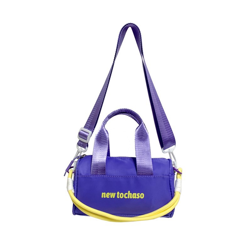 Bolsa de hombro casuales coreana para niños y niñas, letras extranjeras para bebés, bolsas portátiles de balde de agua 2025, nuevas bolsas de comercio exterior para niños