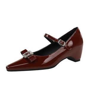 761-H130 Mary Jane women's shoes with a pointed rhinestone bow and a raised height inside, featuring a flat heel an