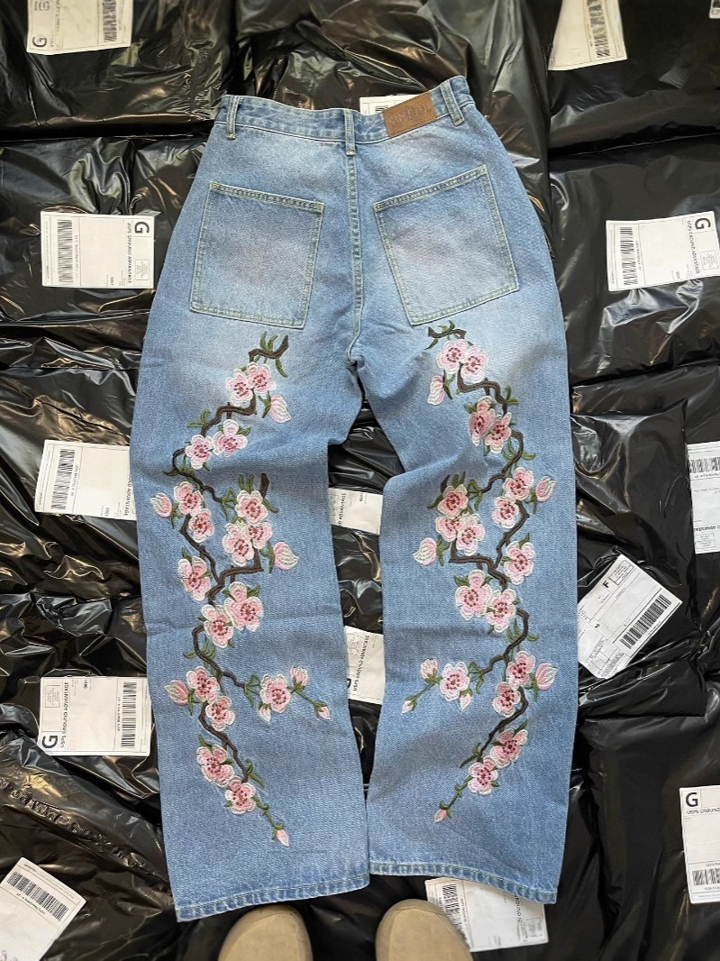 Milenio bug jeans sueltos Harajuku retro flor de cerezo bordado jeans de alta calidad ropa callejera hip hop gótico