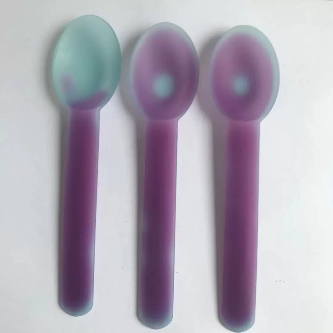 Green purple spoon for ice cream