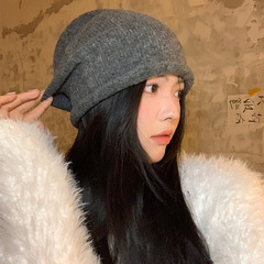 ウールを含む冷たい帽子ネットの赤い帽子の女性の秋冬のぬいぐるみのニットは顔を見せます。