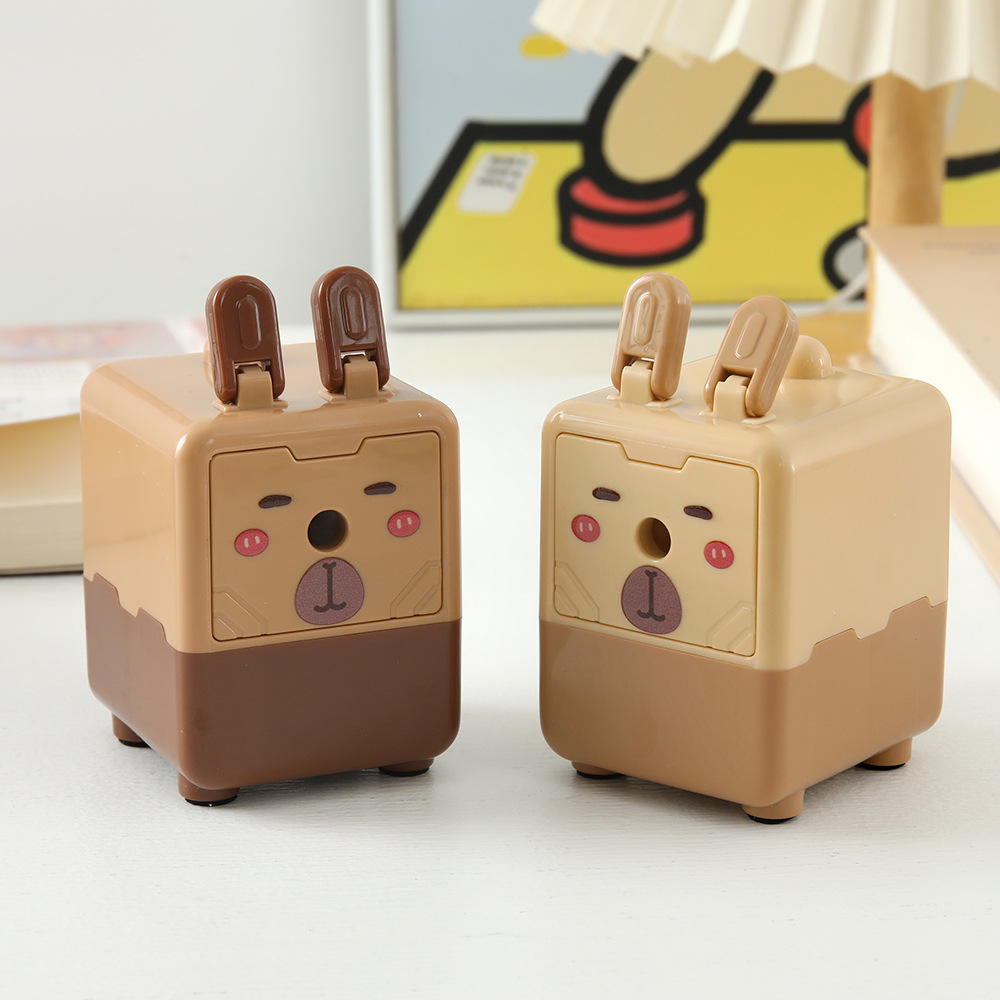 Capibara cuchillo de lápiz manual cuadrado encantador cuchillo de lápiz de Dolphin de alto valor facial para estudiantes de papelería