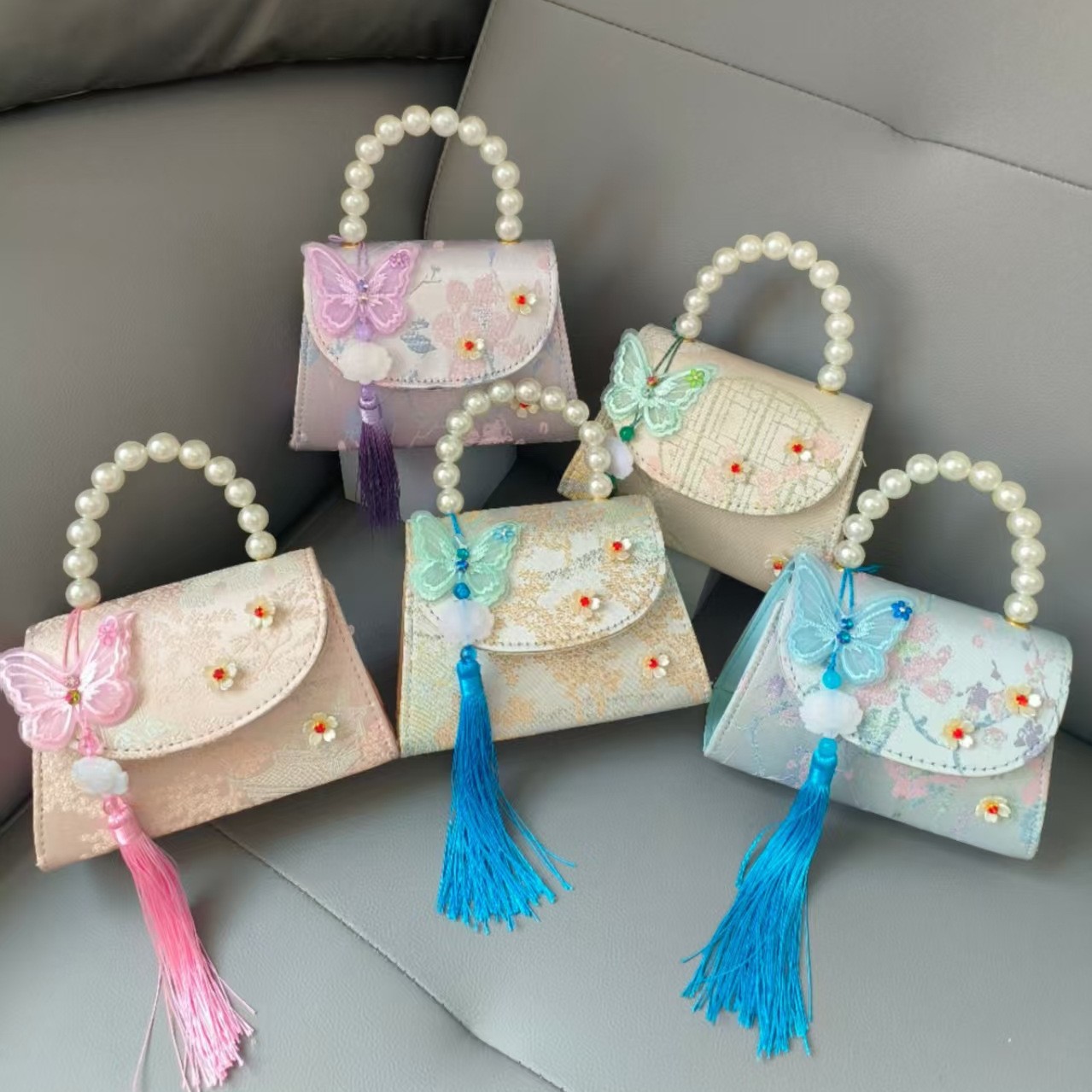 Bolsa portátil de la princesa de perlas estilo nacional arco de hombro bolso de cadena bolso pequeño bolso de cambio de Año Nuevo