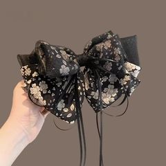 レトロなハイエンドの花柄リボンスプリングクリップ女性の後頭部ハーフヘアピントップクリップ帽子新しいスタイル