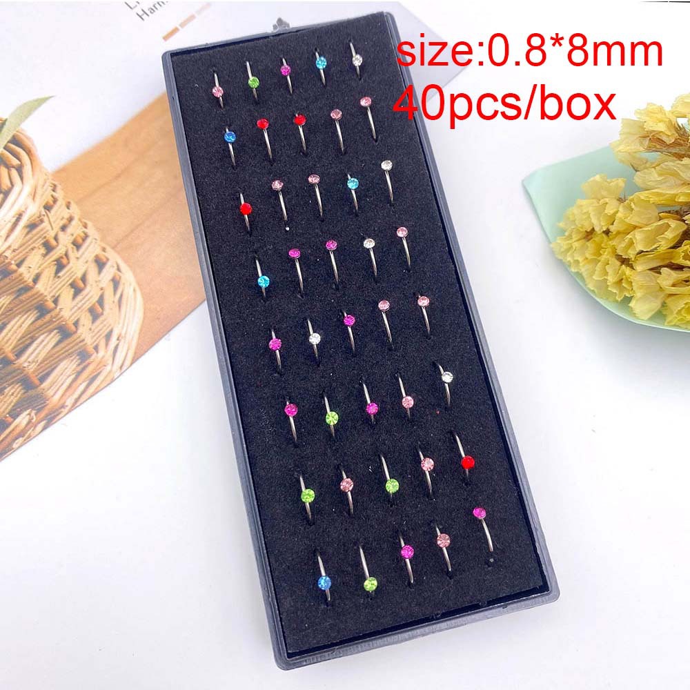 40 piezas/anillo de nariz de diamante de color de acero en caja