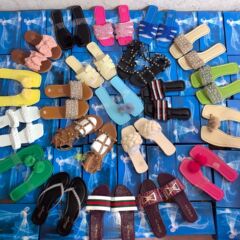 Flat slippers外国貿易の大きいサイズの平底の1字のスリッパの柔らかい底の方の頭の砂浜の外で女性のタイプを着ています。