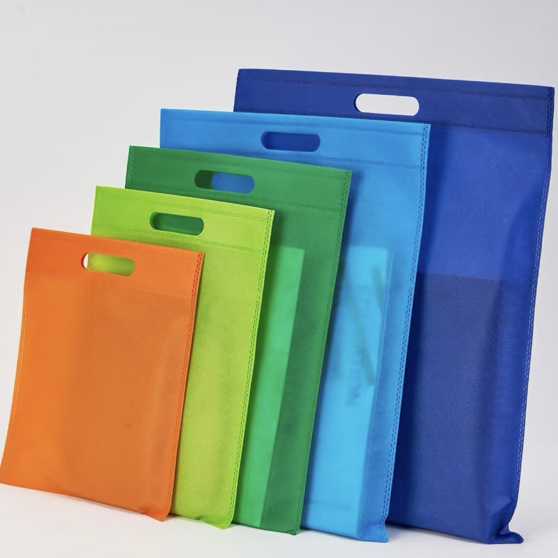 Bolsas de mano no tejidas personalizadas de publicidad ecológica regalos de ropa de compras bolsas de botón ocultas grandes sensación de alta calidad