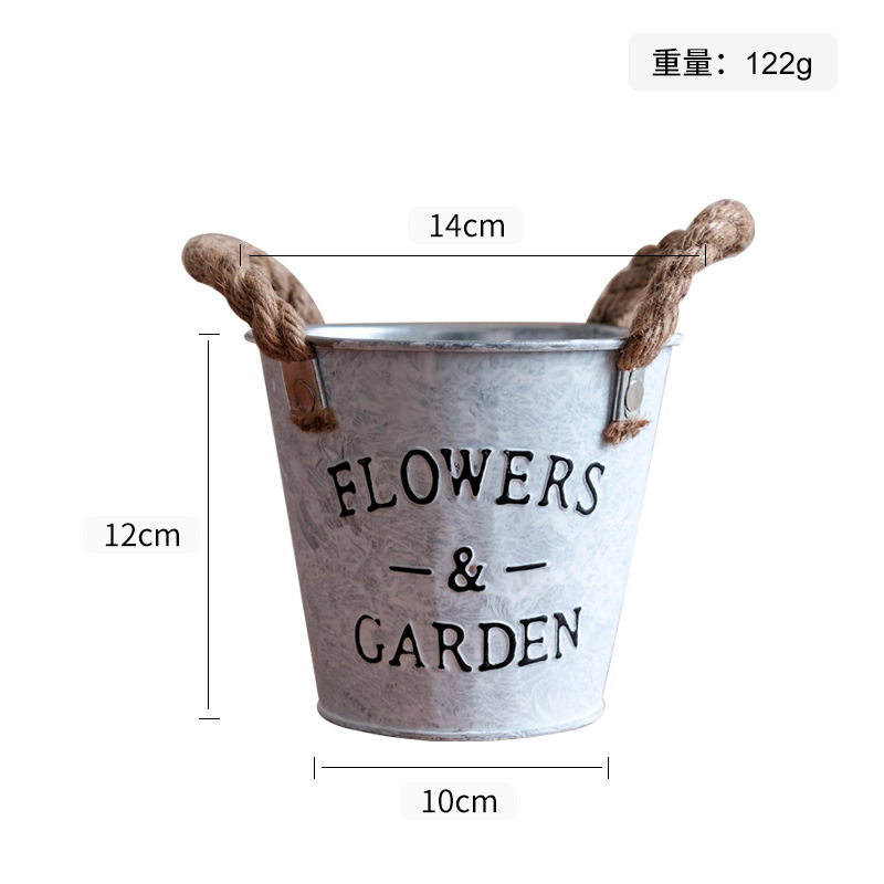 Macetas y cubos de hierro vintage para exportación, macetas decorativas redondas de hojalata con acabado envejecido para plantas verdes y suculentas.