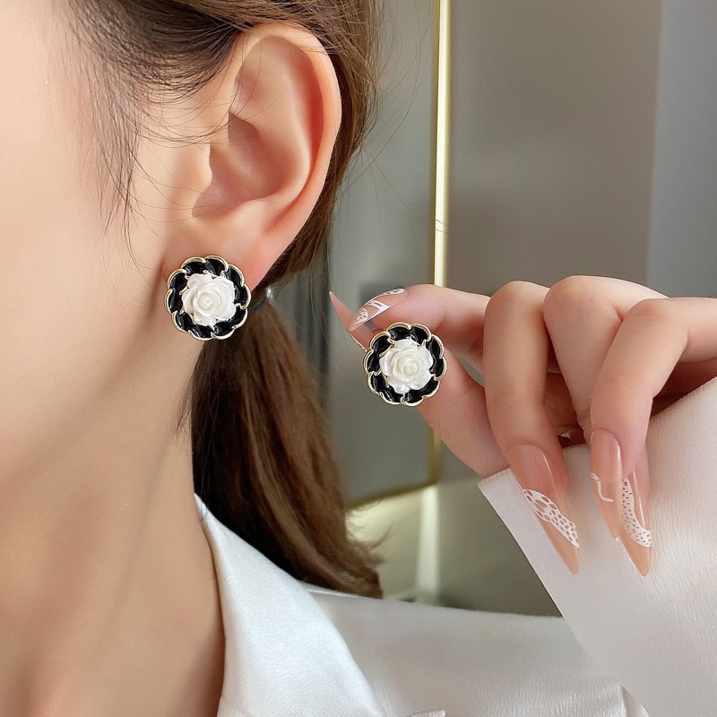 53#黑白小花蚊香盘耳夹