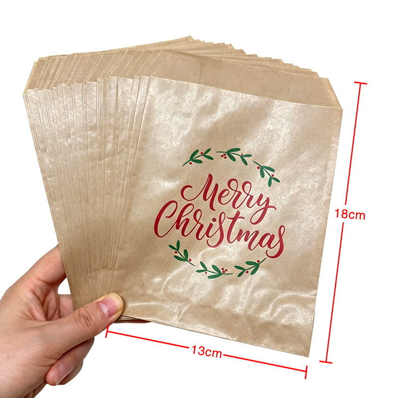 100 un paquete de 13x18CM dulces de Navidad ondulados bolsa de papel transfronteriza bolsa de regalo Merry Christmasmast