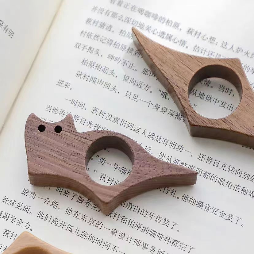 Fuente transfronteriza mascota gato pulgar página prensa de libro anillo de lectura de una mano perezosa lectura apoyar artefacto de lectura