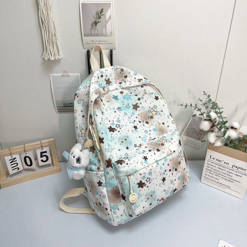 Mochila de estudiantes de alto valor de diseño de tendencia impresa de gran capacidad mochila de flores pequeñas estrellas mochila para mujeres image 14