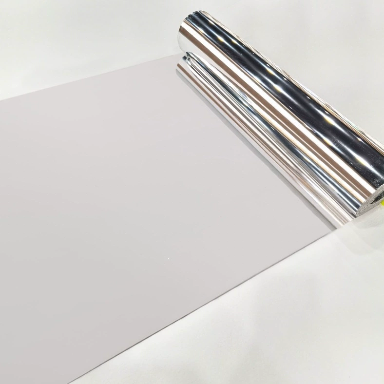 Silver mirror-look wall covering unrolled to show its flexible format