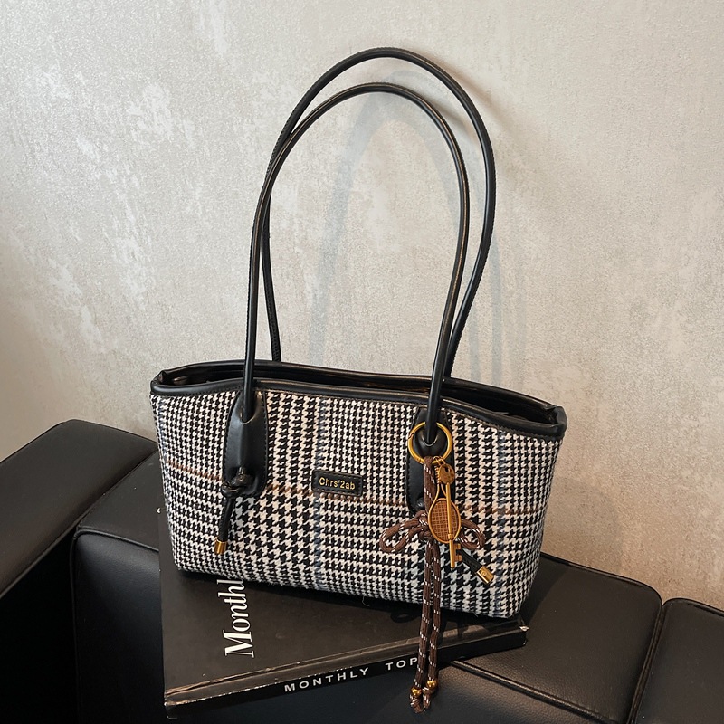 Coreano 1000 pájaros estilo extranjero hombro brazo bolso de viaje de gran capacidad para mujeres 2025 nuevo bolso de moda