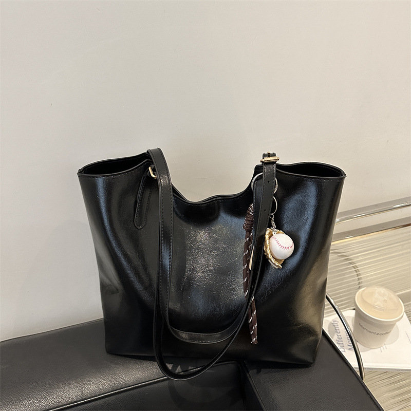 Bolsa de moda suave pittot2025 primavera nueva gran capacidad de viaje minimalista bolso de hombro para estudiantes universitarios