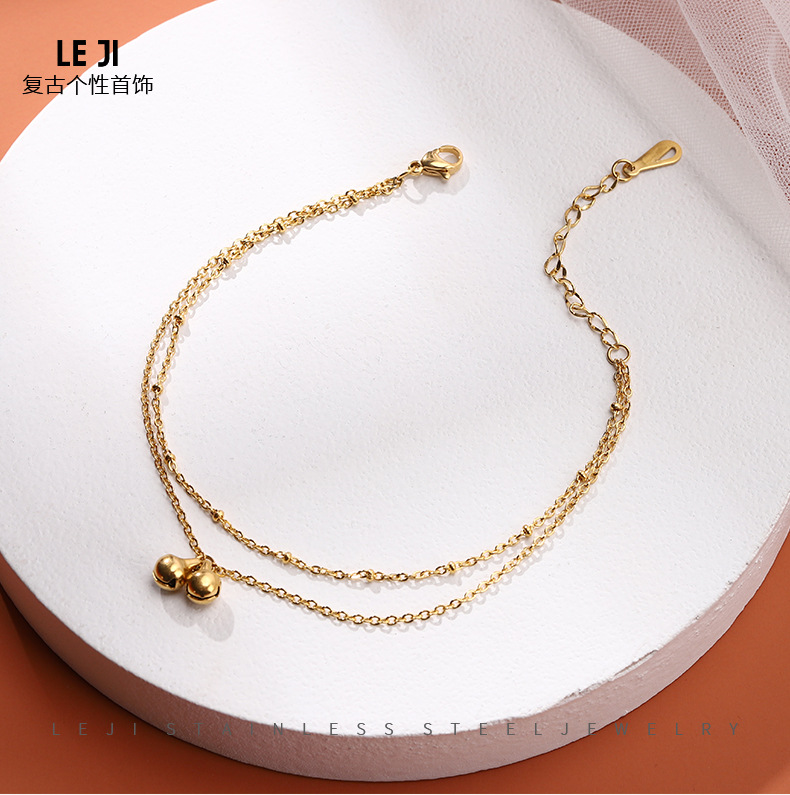 JL-0137: pequeña campana de oro elegante